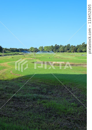 The coolness of early morning at the park golf course Midsummer scenery The coolness of early morning at the park golf course Midsummer scenery 118452805