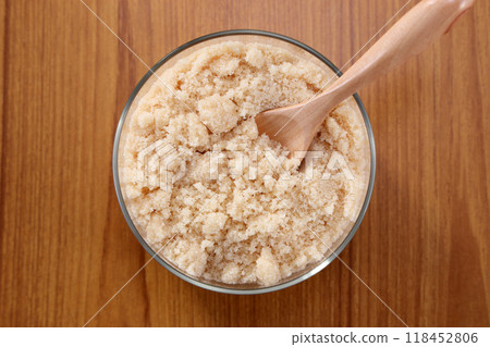 Brown sugar in a transparent container Brown sugar in a transparent container 118452806