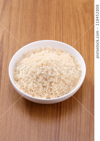 Brown sugar in a white dish Brown sugar in a white dish 118452808