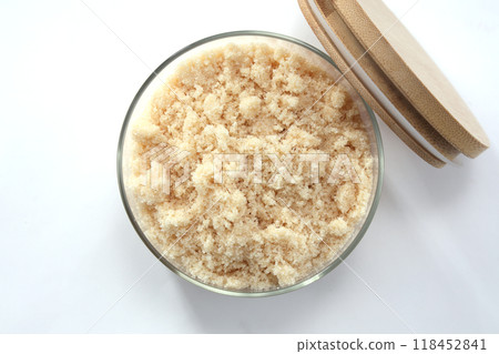 Brown sugar in a transparent container Brown sugar in a transparent container 118452841