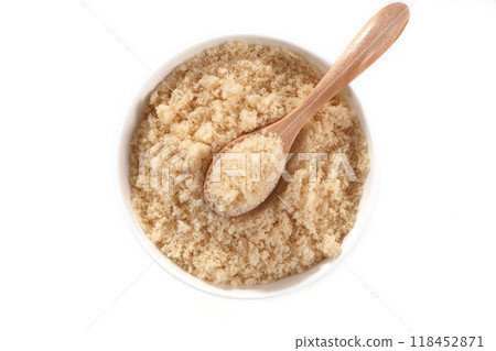 Brown sugar on a spoon Brown sugar on a spoon 118452871