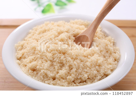 Brown sugar served on a white plate Brown sugar served on a white plate 118452897