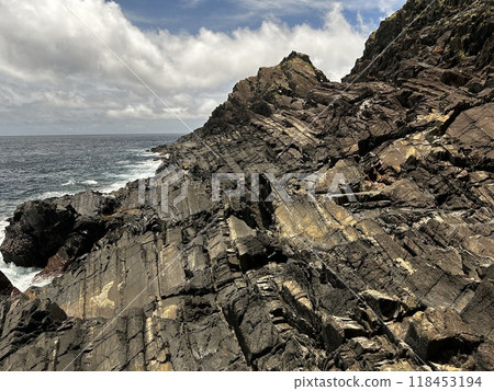 Near the Father Sidotti Landing Monument in Yakushima JAPAN, there is a beach where you can enjoy the magnificent terrain, geological formations and huge rocks. Near the Father Sidotti Landing Monument in Yakushima JAPAN, there is a beach where you can enjoy the magnificent terrain, geological formations and huge rocks. 118453194