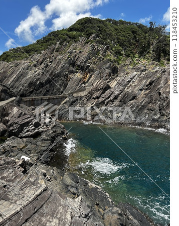 Near the Father Sidotti Landing Monument in Yakushima JAPAN, there is a beach where you can enjoy the magnificent terrain, geological formations and huge rocks. Near the Father Sidotti Landing Monument in Yakushima JAPAN, there is a beach where you can enjoy the magnificent terrain, geological formations and huge rocks. 118453210
