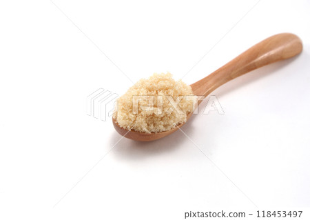 Brown sugar on a spoon Brown sugar on a spoon 118453497