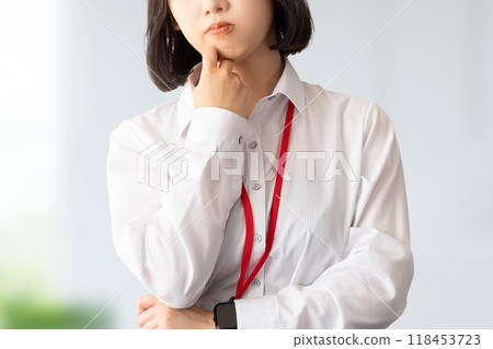 A young woman/businesswoman thinking A young woman/businesswoman thinking 118453723