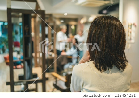 Female customer waiting at a beauty salon 118454251