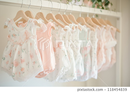 Pink-themed baby clothes closet 118454839