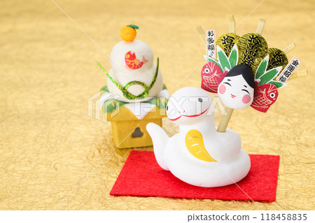 Zodiac Year of the Snake (Snake holding a rake) 118458835