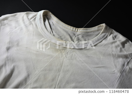 Yellowing, stains, and wrinkles on shirts Yellowing, stains, and wrinkles on shirts 118460478