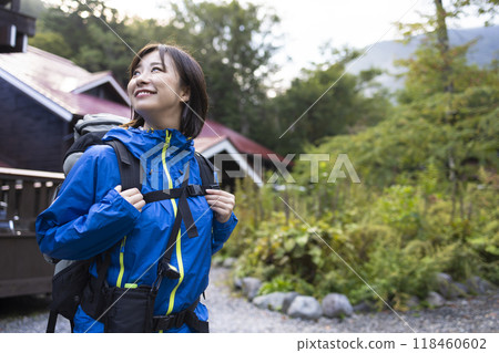 Woman hiking 118460602