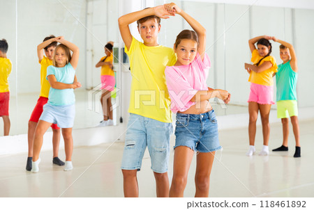 Active young children enjoying of partner dance in class 118461892