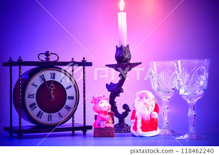 New year Christmas.Santa Claus. vintage clock, wine glasses, burning candle New year Christmas.Santa Claus. vintage clock, wine glasses, burning candle 118462240
