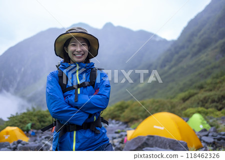 Mountain girl camping in a tent 118462326