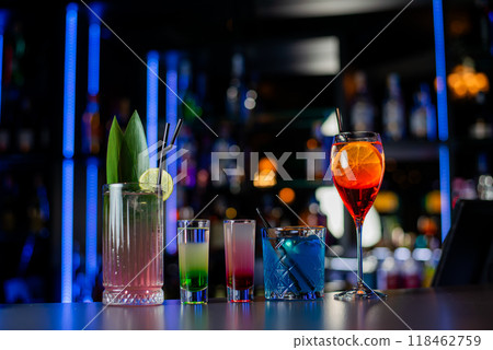 Cocktails set on a bar at Casino. Cocktails assortment. 118462759
