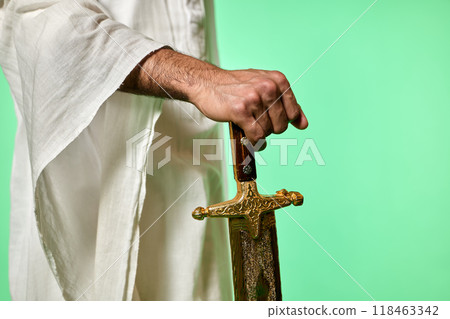 Traditional Saudi out-feet on chromakey. Arabian long saber - saif. 118463342