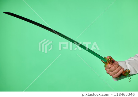 Traditional Saudi out-feet on chromakey. Arabian long saber - saif. 118463346
