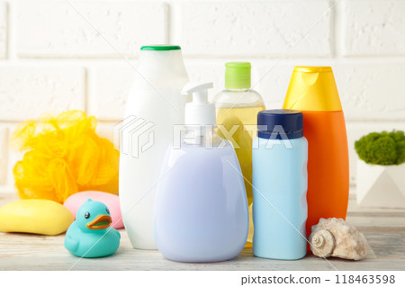 Toiletries baby on light background. Baby shower gel Toiletries baby on light background. Baby shower gel 118463598