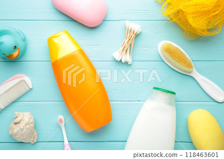 Toiletries baby on blue background. Baby shower gel. Toiletries baby on blue background. Baby shower gel. 118463601