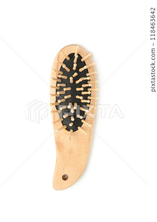 Wooden comb brush isolated on white background, clipping path. 118463642