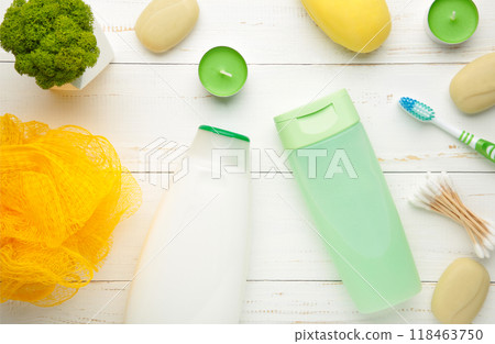 Shampoo, soap, aroma candles and other toiletry. Spring composition on light background 118463750
