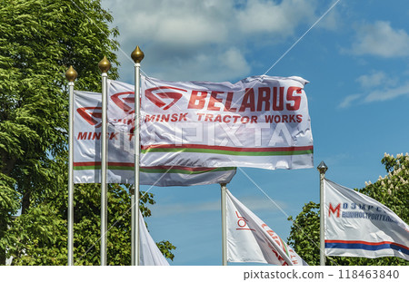 Belarus, Minsk - 27.05.2017: White flag with the logo of the Minsk Tractor Plant. White flag with the Minsk Tractor Plant logo 118463840