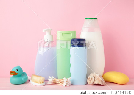Toiletries baby on light background. Baby shower gel Toiletries baby on light background. Baby shower gel 118464198