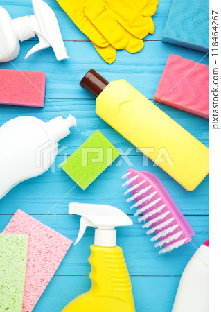 Set of cleaning tools on a blue background with copy space. Vertical foto 118464267