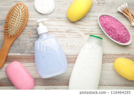 Bath products on light background. Shower gel with aromatic salt, soap and other toiletry. 118464285