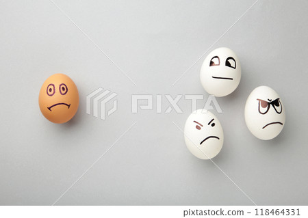Eggs with different emotions on his face. Easter composition with copy space on grey background. Stop racism 118464331
