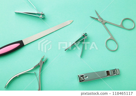 Tools of a manicure set on mint background Tools of a manicure set on mint background 118465117