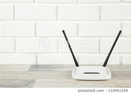 Wireless Wi-Fi router on a white background with copy space Wireless Wi-Fi router on a white background with copy space 118465260