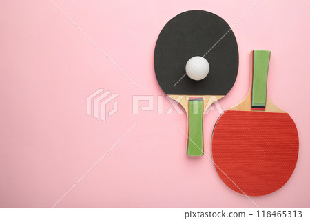 Ping pong rackets and ball on pink background with copy space. 118465313
