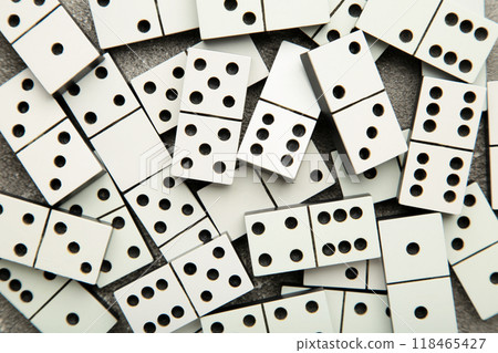 Domino pieces on the grey background. Macro photo Domino pieces on the grey background. Macro photo 118465427