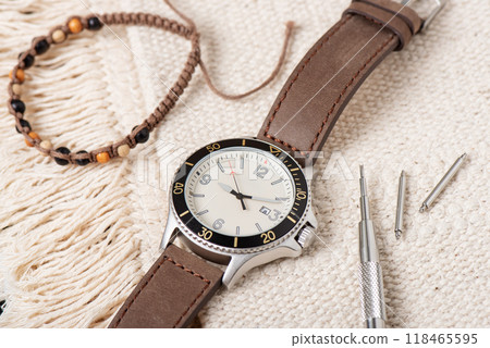 cream men wristwatch 118465595