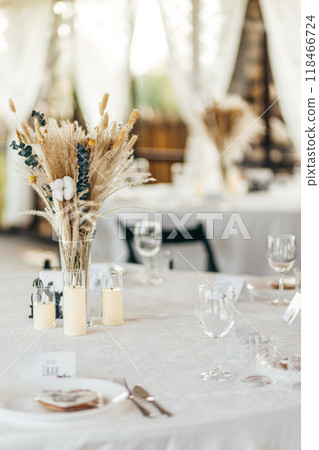 Detail of a wedding dinner setting, summer event Detail of a wedding dinner setting, summer event 118466724