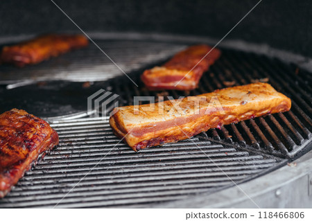 Mouthwatering Rack of Ribs on Round Grill. Glazed Barbecue Meat Over Hot Coals Mouthwatering Rack of Ribs on Round Grill. Glazed Barbecue Meat Over Hot Coals 118466806