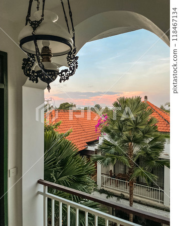 View from the villa balcony to a tropical sunset 118467134