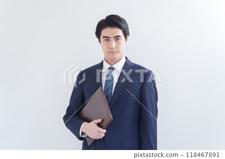 Working businessman (white background) Working businessman (white background) 118467891