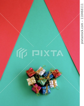 Christmas gifts on a red and green background Christmas gifts on a red and green background 118468111