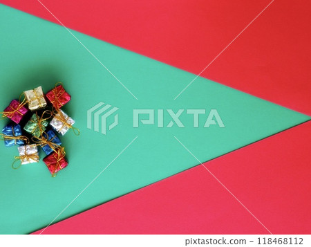 Christmas gifts on a red and green background Christmas gifts on a red and green background 118468112