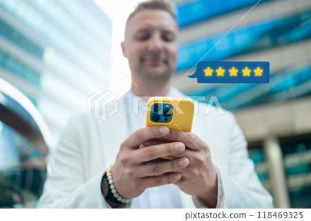 Customer satisfaction experience concept. Businessman using mobile phone giving 4 star icon and excellent for feedback review satisfaction service. rating very impressed. Customer satisfaction experience concept. Businessman using mobile phone giving 4 star icon and excellent for feedback review satisfaction service. rating very impressed. 118469325