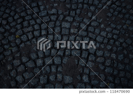 Square pavement paved with gray cobblestones rectangles texture. Cobble stone walkway Square pavement paved with gray cobblestones rectangles texture. Cobble stone walkway 118470690