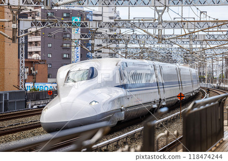 Nozomi train passing through Hamamatsu Station 118474244
