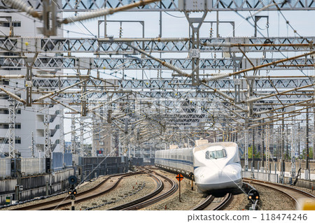 Nozomi train passing through Hamamatsu Station 118474246