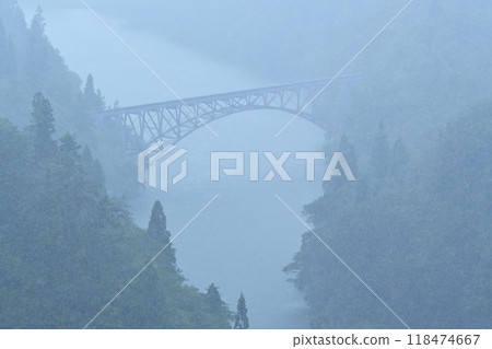 Tadami Line running in fog Tadami Line running in fog 118474667