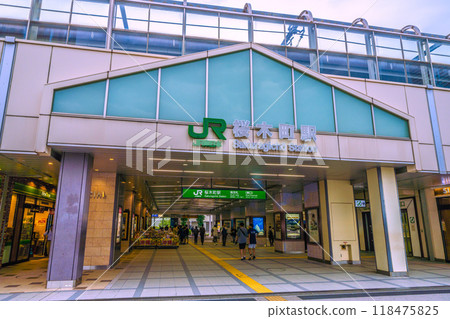 View of the cityscape of Yokohama, Japan, including the south ticket gate (east exit) of Sakuragicho Station. (In front of the station are the Yokohama Landmark Tower and other attractions.) 118475825