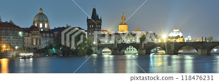 Panoramic night view of the iconic Charles Bridge over Vltava river and Prague Old town cityscape, in Prague, Czech Republic 118476231