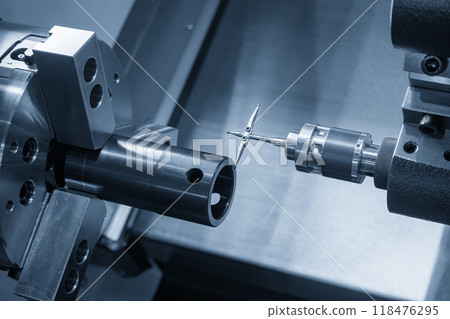 Close up scene the modular touch probe checking the tube parts on CNC lathe machine. Close up scene the modular touch probe checking the tube parts on CNC lathe machine. 118476295