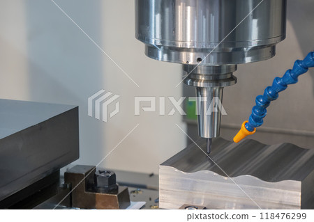 The CNC milling machine cutting mold part by solid ball end mill tool. The CNC milling machine cutting mold part by solid ball end mill tool. 118476299